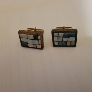 A pair of opal and sterling Bloomingdale's cufflinks